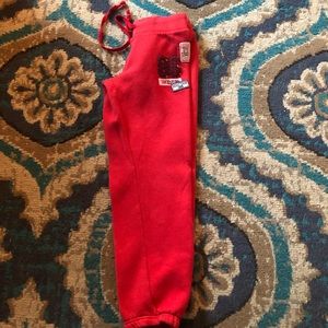 Red xs Pink sweatpants